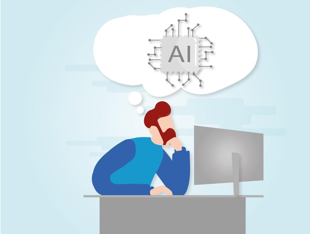 パソコンと統計データを確認するビジネスパーソン
